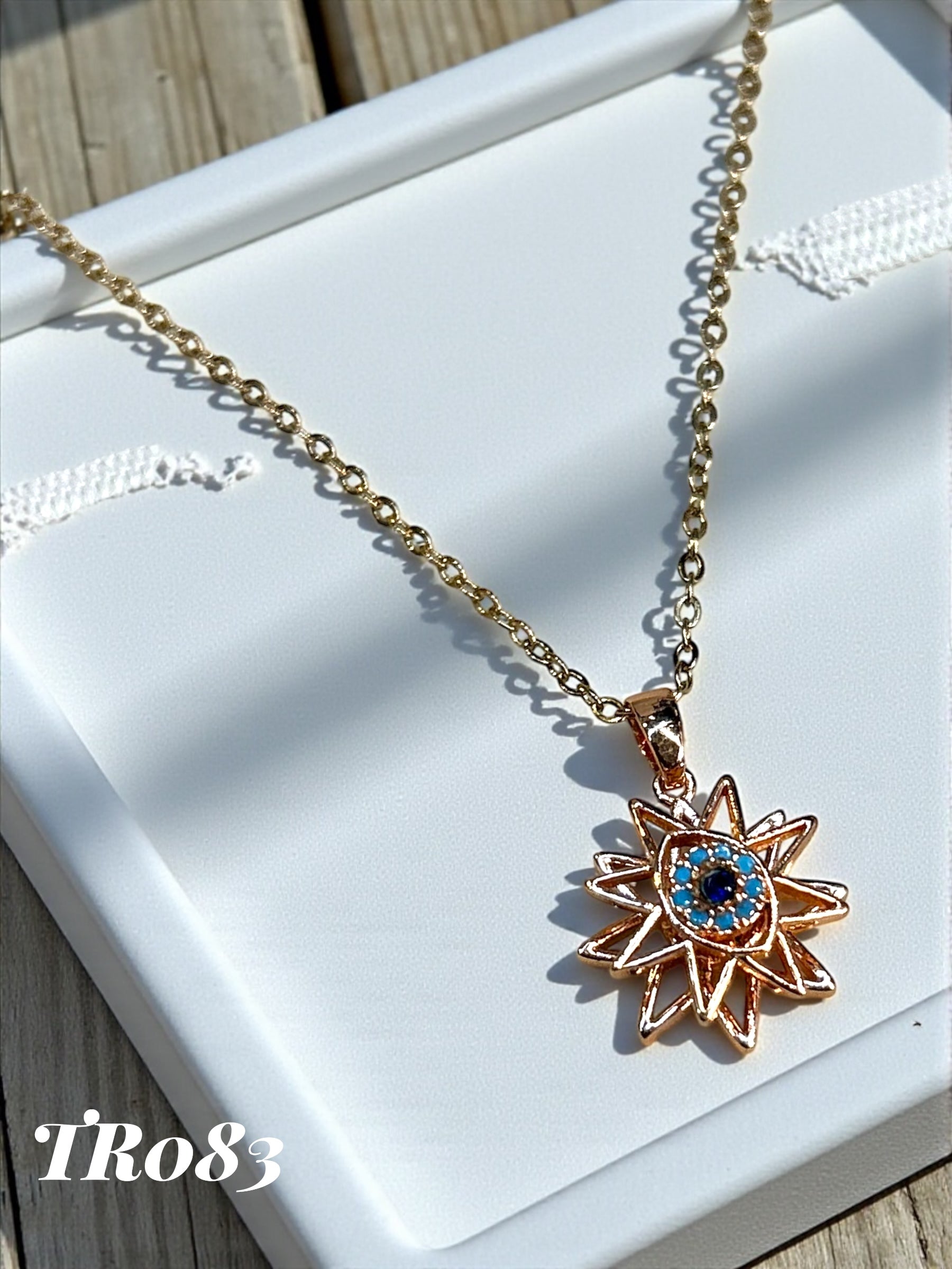 TR083- ROTATING PENDANT