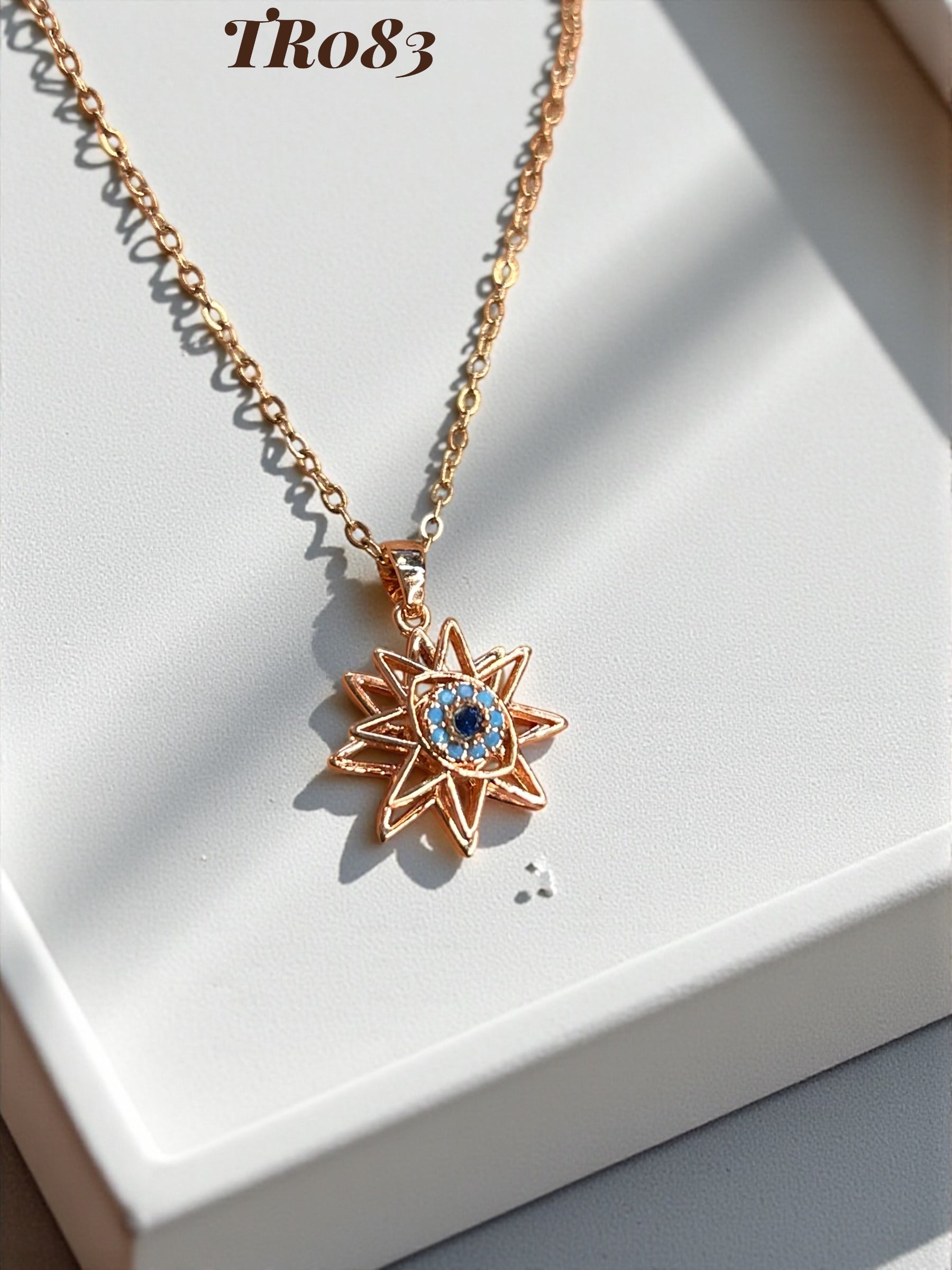 TR083- ROTATING PENDANT